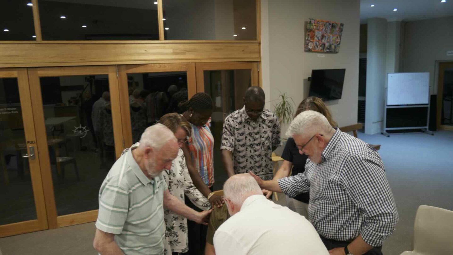 Anglican Bishop Richard Condie anointing me with oil and laying hands on me for my healing